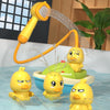 Yellow duck bath toys with a water gun and green rubber duckie in a bathtub.