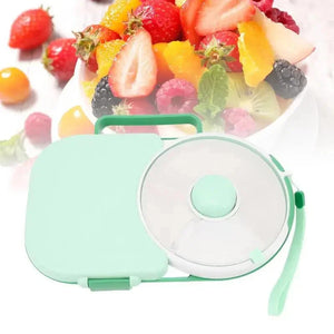 Green snack container with a colorful background of fruits