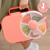 Coral-colored lunch box with compartments filled with snacks, held by a person.