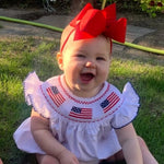 Tiny&Thrive Smocked Baby Girl Clothes – 4th of July Bubble Romper with Fly Sleeves & American Flag Embroidery | Patriotic Infant Outfit