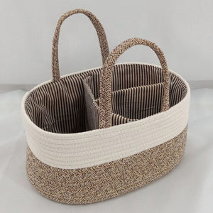 Woven basket with striped interior on a light gray background
