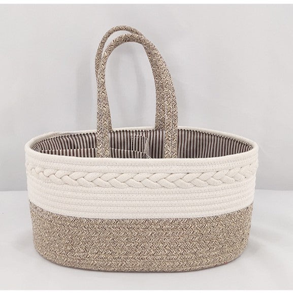 Woven basket with striped interior on a light gray background