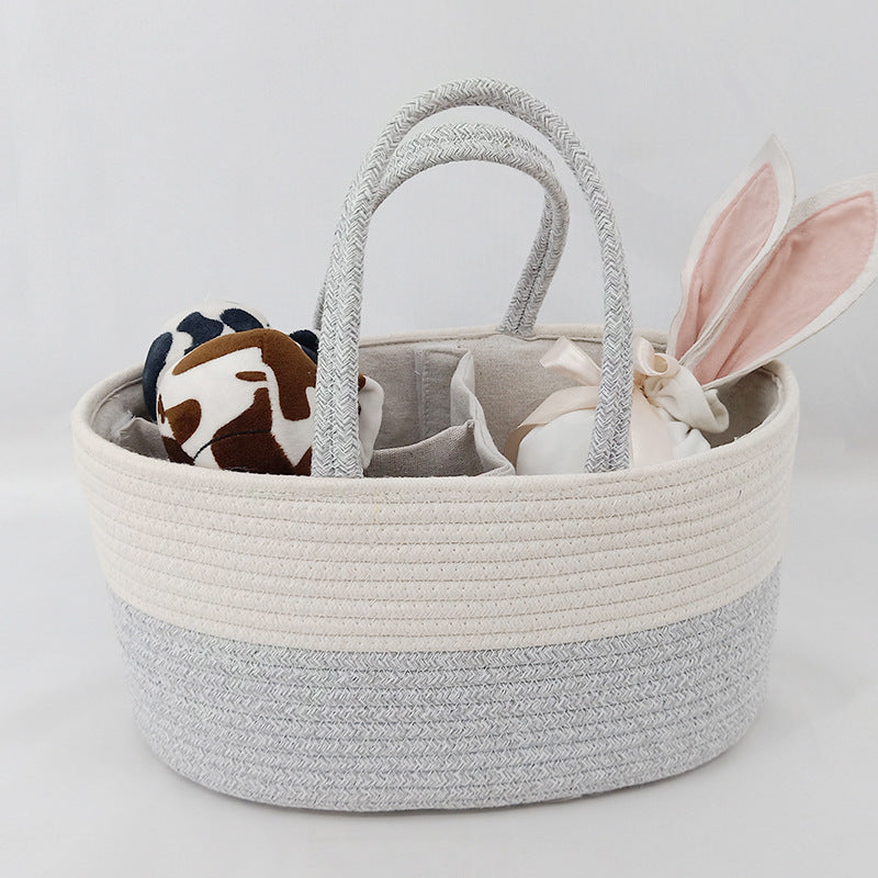 Woven basket with toys on a light background