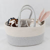 Woven basket with toys on a light background