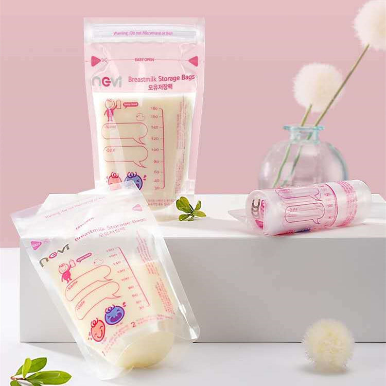Breastmilk storage bags with packaging on a pink background