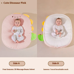 Baby nest with dinosaur design in pink and white on a beige background