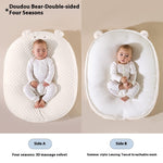 Baby in a double-sided baby nest with different textures on each side.