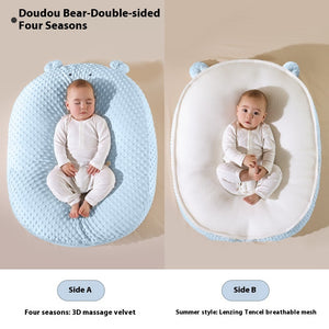 Baby lying on a blue and white Doudou Bear double-sided cushion with text indicating different fabric types.