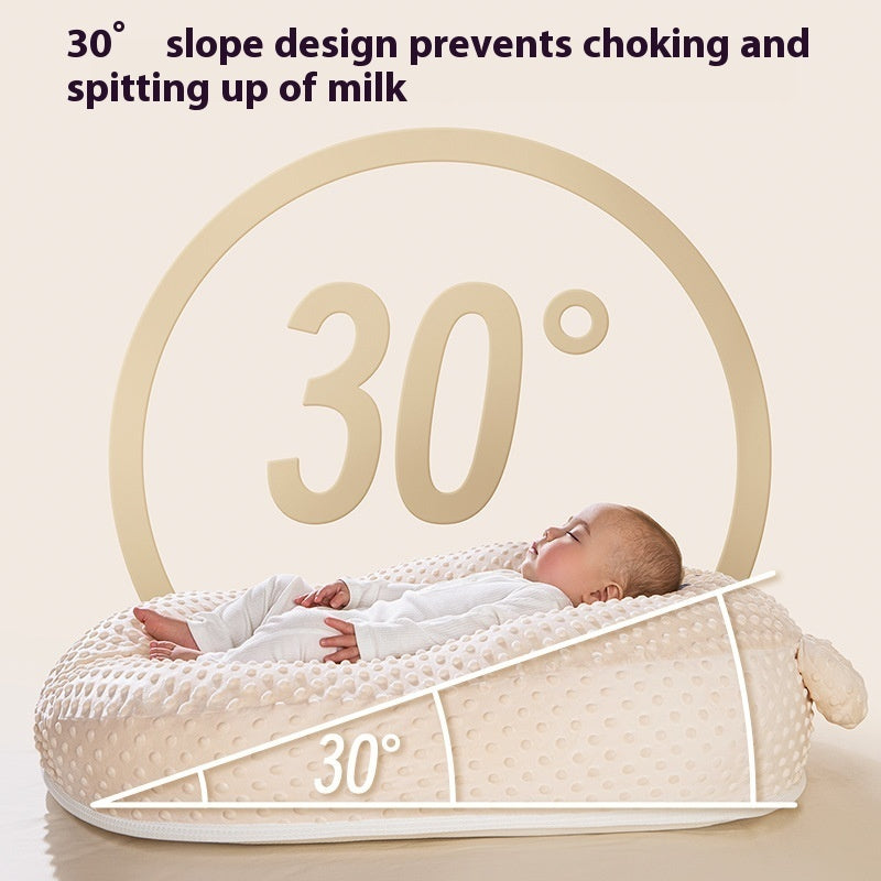 Baby lying on a 30-degree slope design crib to prevent choking and spitting up of milk.