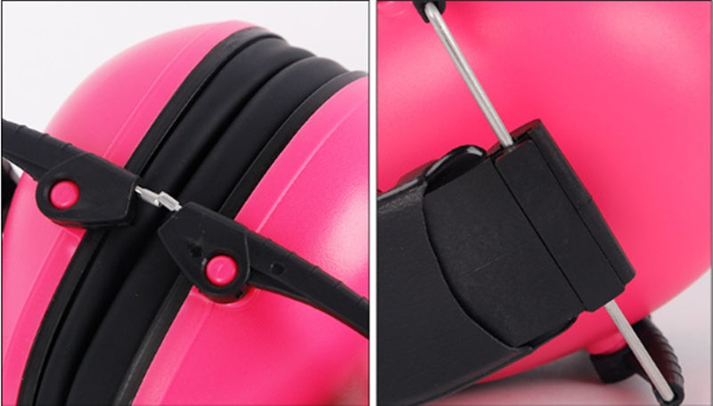 Close-up of a pink ear vover with a black strap on a white background