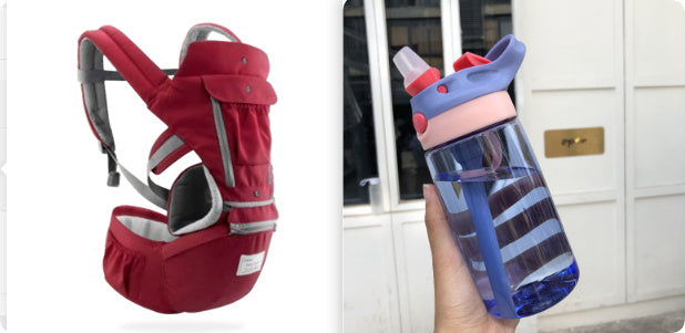 Red baby carrier and blue water bottle with pink lid on a white background
