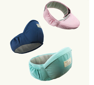 Three baby carriers in blue, pink, and green on a white background