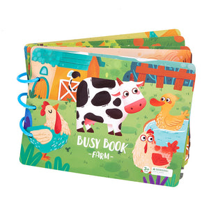 Colorful children's busy book with farm animals on a white background