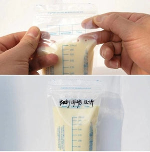 Hands holding a breast milk storage bag with measurement markings and a label.