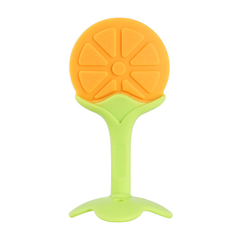 Orange and green baby teether on a white background