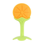 Orange and green baby teether on a white background