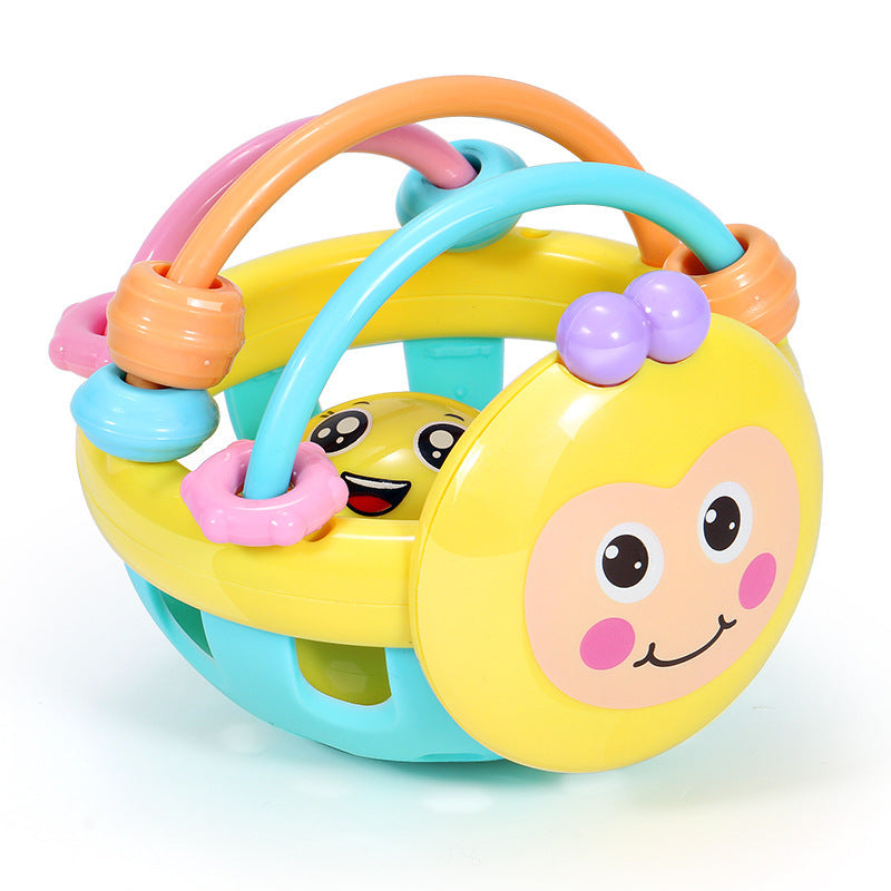 Colorful baby toy with a smiling face on a white background
