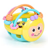 Colorful baby toy with a smiling face on a white background
