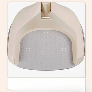 Beige and gray pet litter pan on a white background