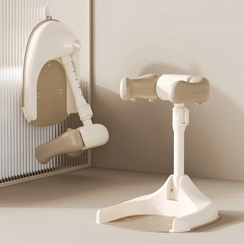 White massage device with arm and leg attachments on a neutral background