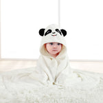 Child wrapped in a panda-themed hooded towel on a white background