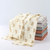 Folded fabric with a pattern on a white background