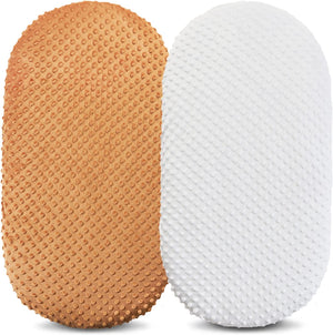 Two textured foam rollers, one brown and one white, on a light gray background.