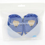 Pair of blue baby socks with bear design in clear packaging