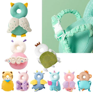 Set of colorful baby toys with animal designs on a green background