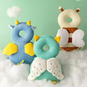 Three soft toys shaped like animals on a cloud with a light green background
