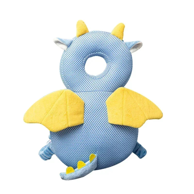 Blue and yellow dragon-shaped baby head support pillow on a white background
