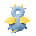 Blue and yellow dragon-shaped baby head support pillow on a white background