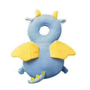 Blue and yellow dragon-shaped baby head support pillow on a white background
