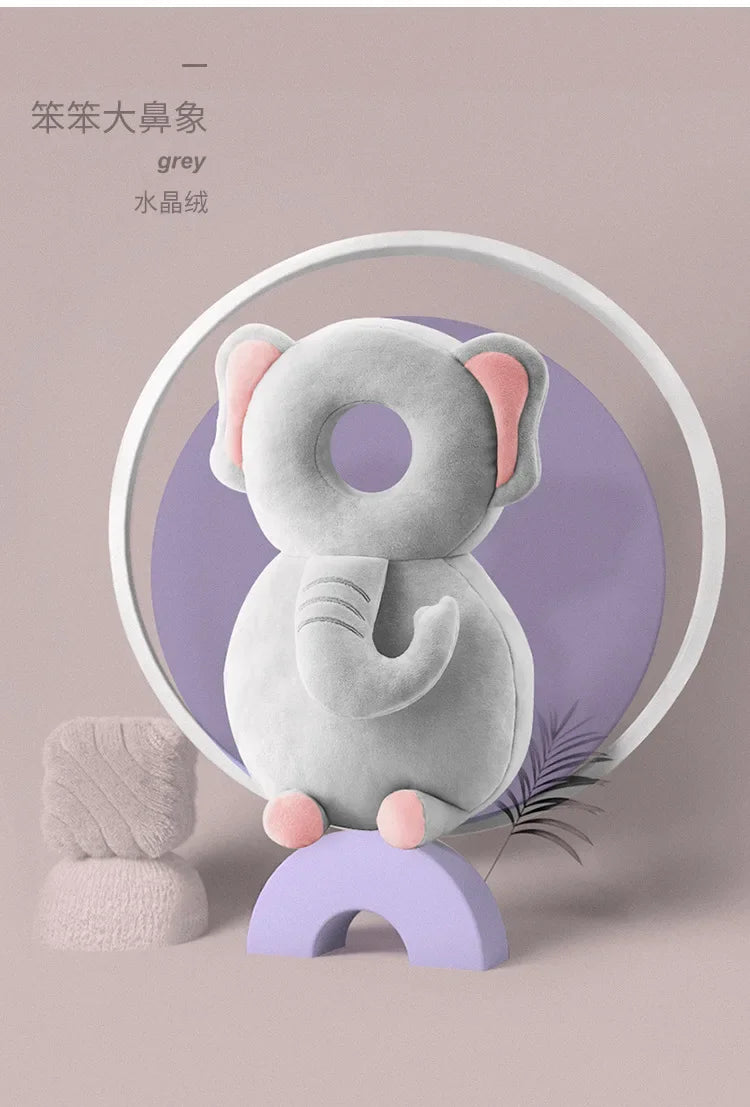 Gray elephant-shaped product on a purple stand with a circular light in the background