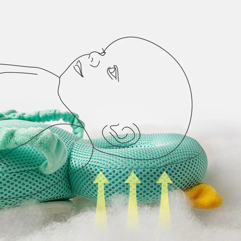 Turquoise pillow with mesh design on a white background