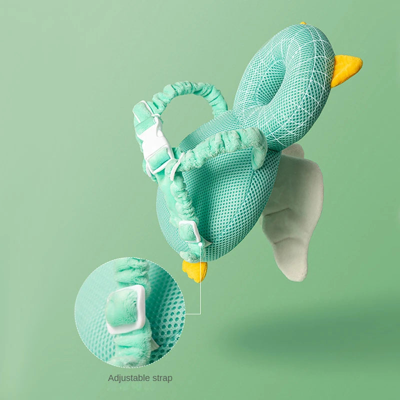 Green mesh baby seat with adjustable strap on a green background