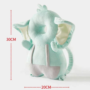 Plush elephant toy with measurements on a white background