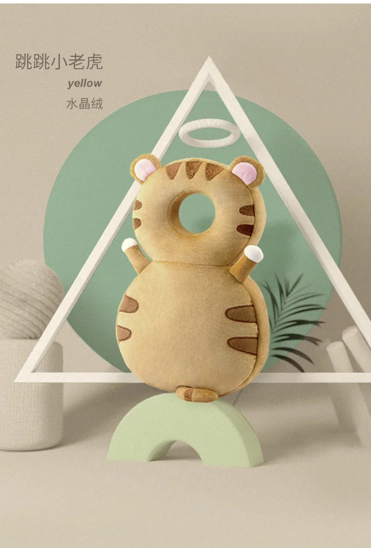 Plush toy tiger on a stand with a geometric background