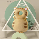 Plush toy tiger on a stand with a geometric background