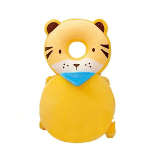 Yellow tiger-shaped plush toy with a blue bib on a white background
