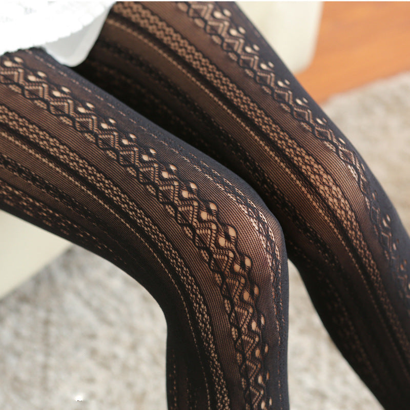 Close-up of brown patterned fabric on a neutral background