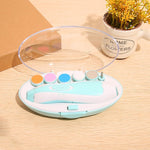 Colorful electronic device on a wooden surface with a plant in the background