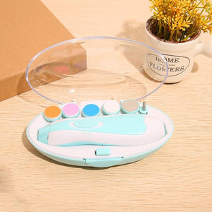 Colorful electronic device on a wooden surface with a plant in the background