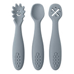 Three gray baby utensils with different designs on a white background