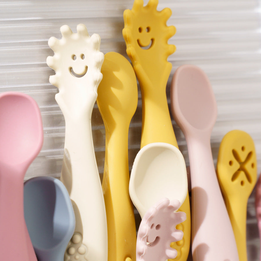 Colorful silicone spoons with unique designs on a neutral background