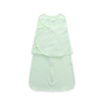 Light green sleeveless dress with layered design on a white background