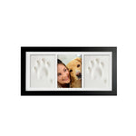 Memorial photo frame with white paw prints on a white background