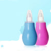 Two baby bottles, one blue and one pink, on a light blue background.