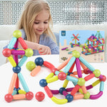 Colorful building block set with a child playing with it, inset showing a diagram of a structure.