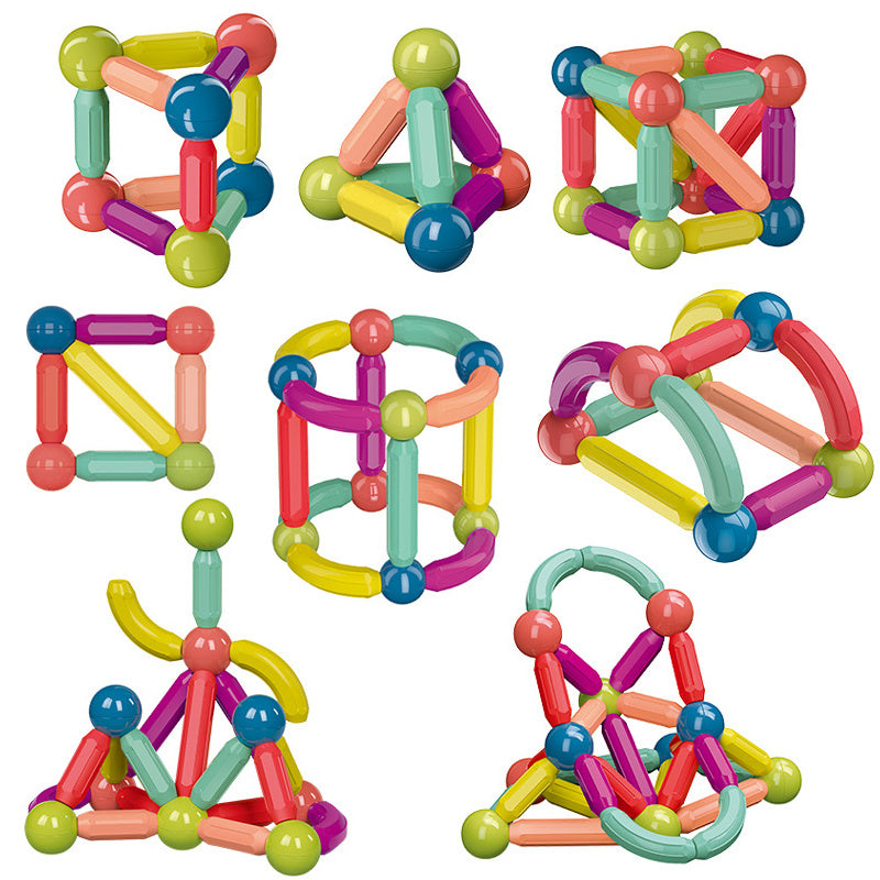 Colorful magnetic building blocks on a white background